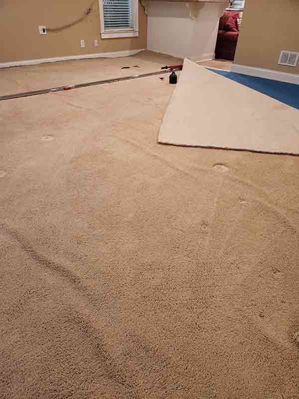 carpet repair restretching basement room