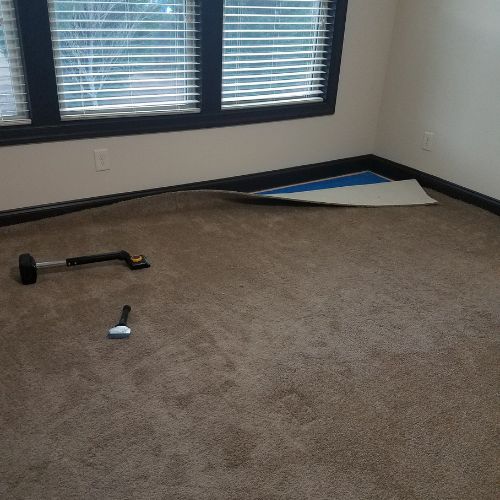 carpet repair stretching in master bedroom