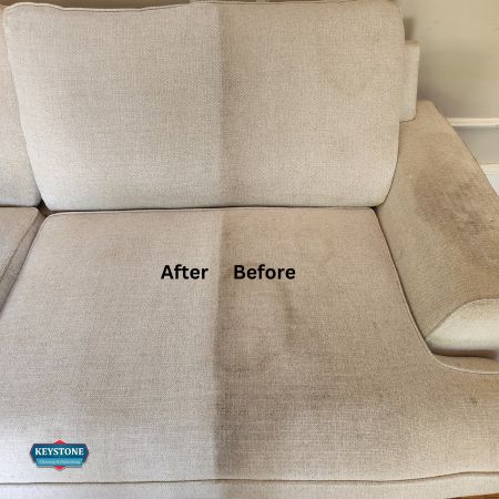white sofa getting upholstery cleaning service before and after cleaning is completed