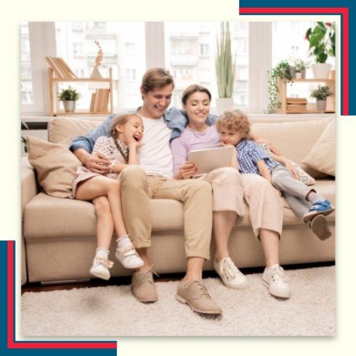 happy family sitting on freshly cleaned sofa on the computer